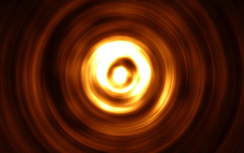 swirling golden light tunnel