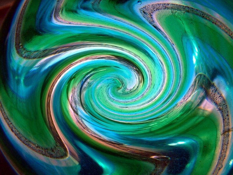 Swirling green and blue glass