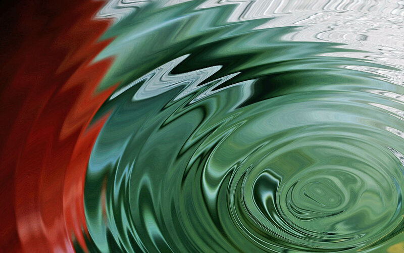 swirling green and red abstract pattern
