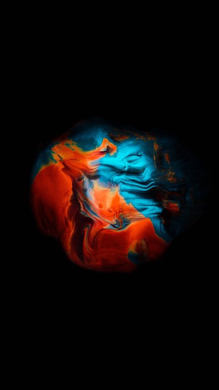 Swirling Red and Blue Liquid