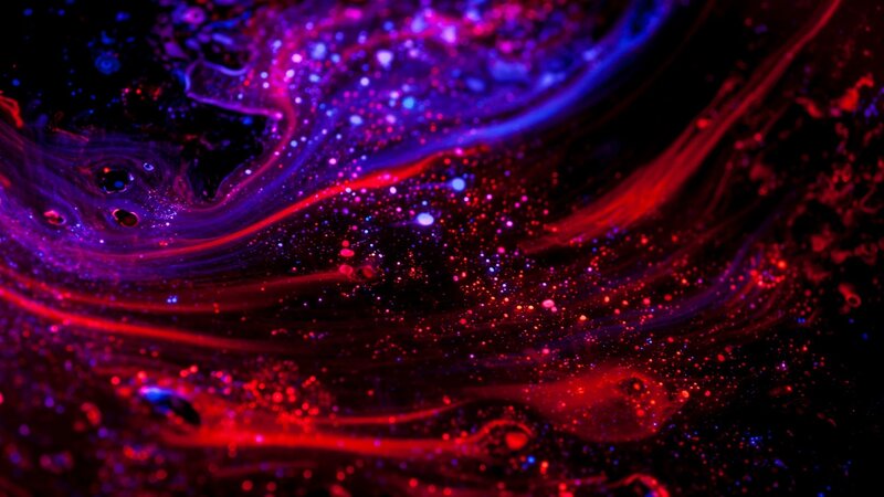 Swirling Red and Purple Liquid