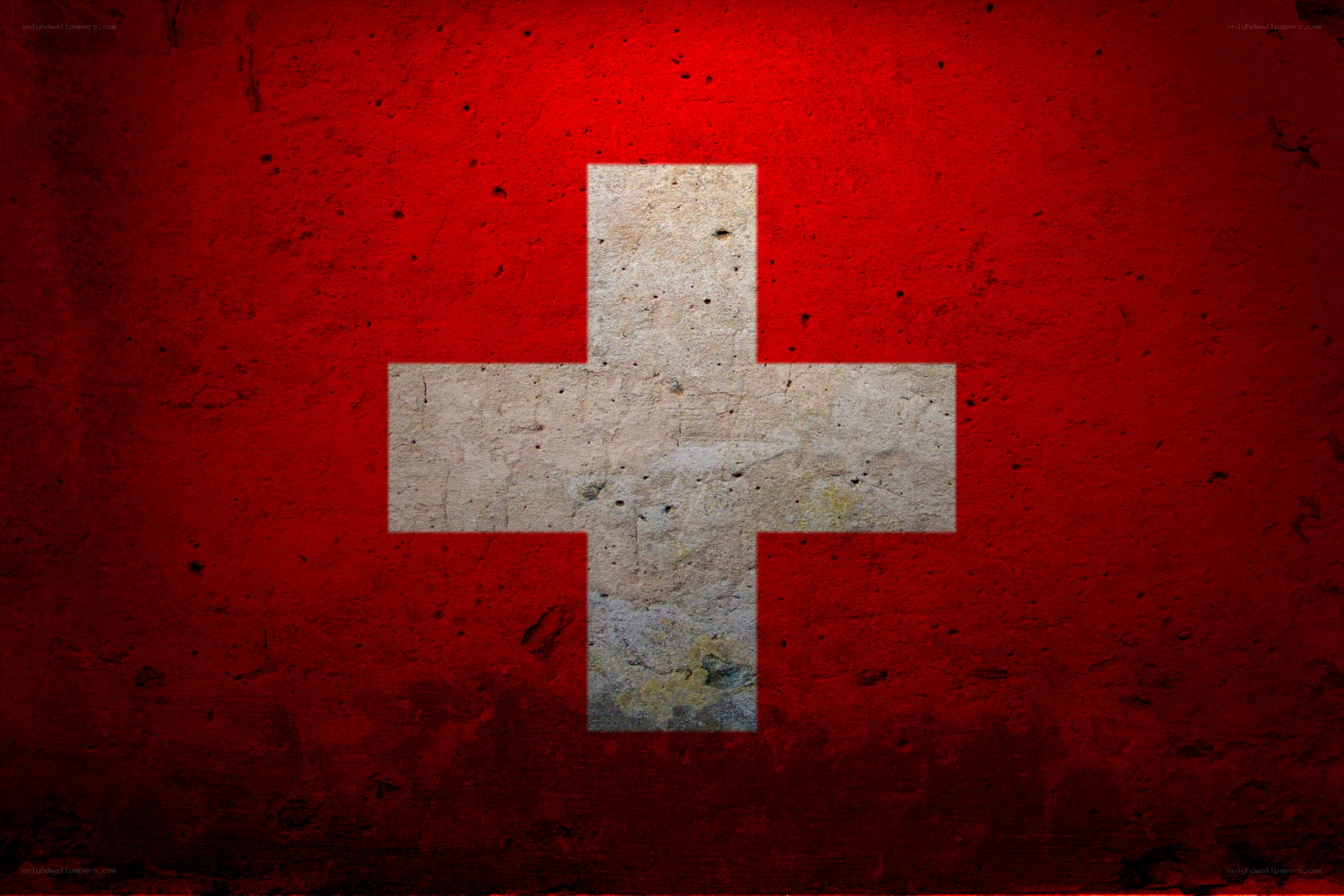 Swiss flag on textured wall