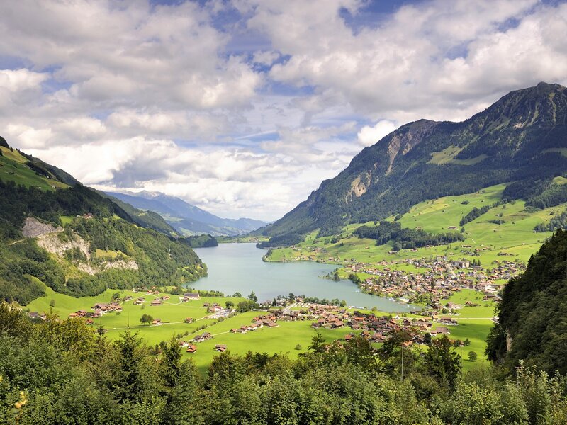 Swiss valley with lake and village