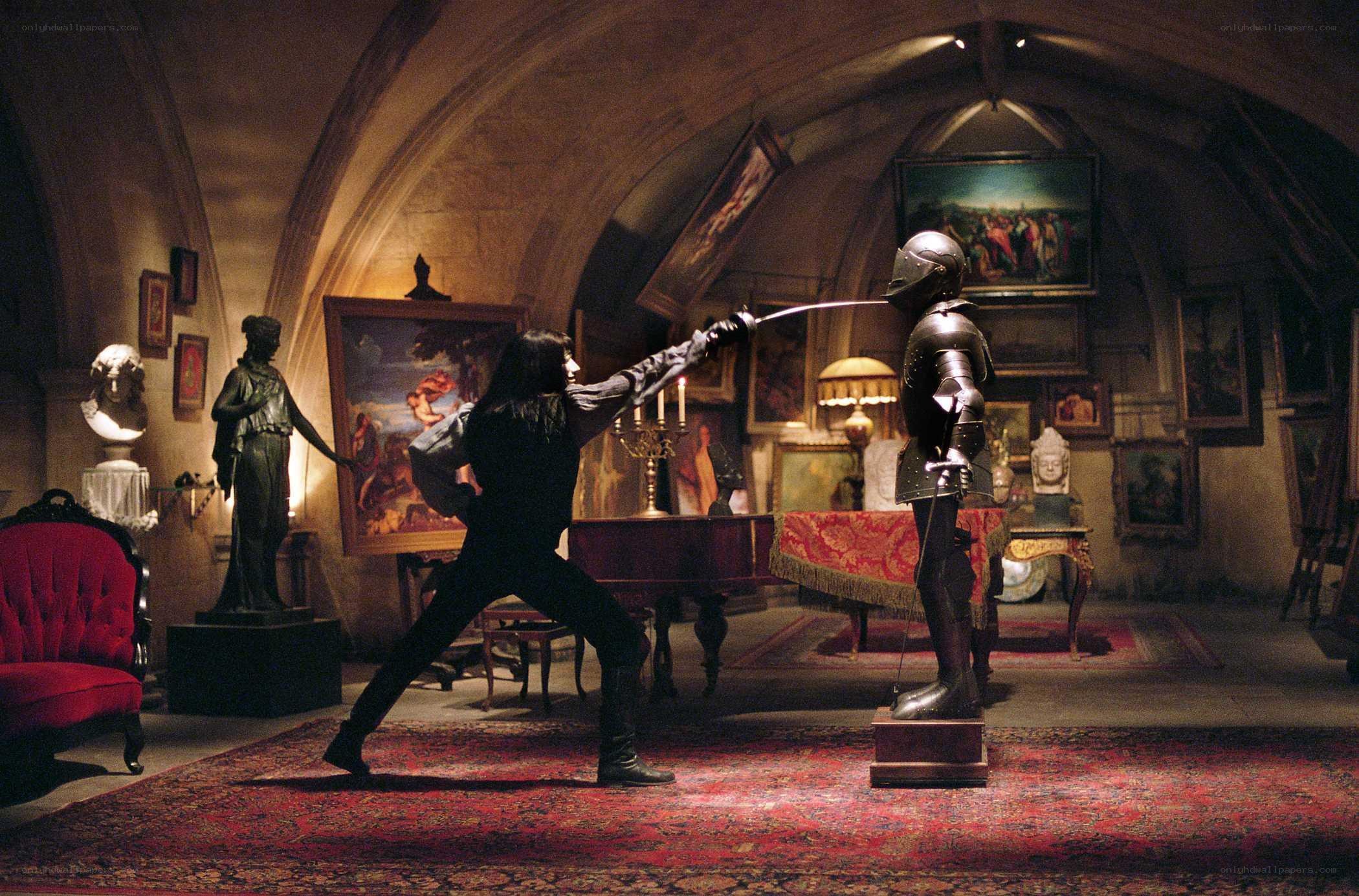 Sword fight in art gallery