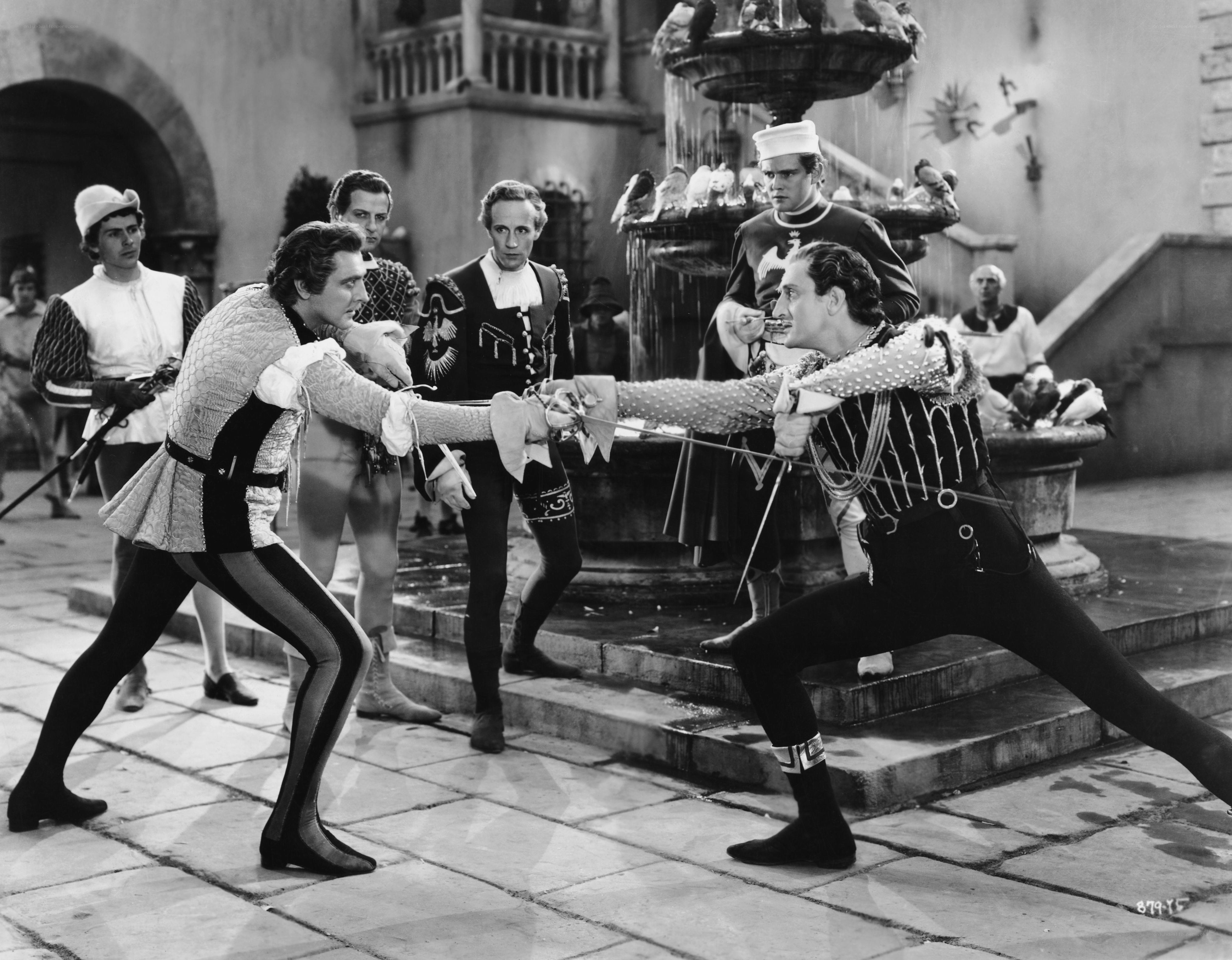 Sword fight in courtyard