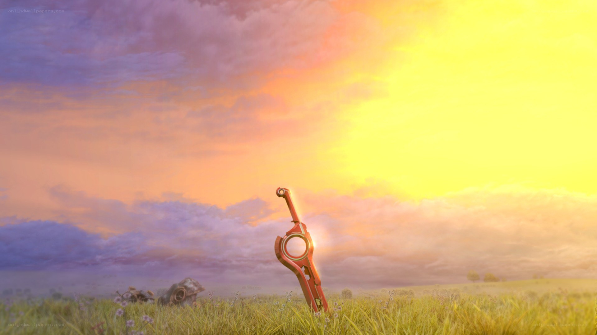 sword in a field at sunset