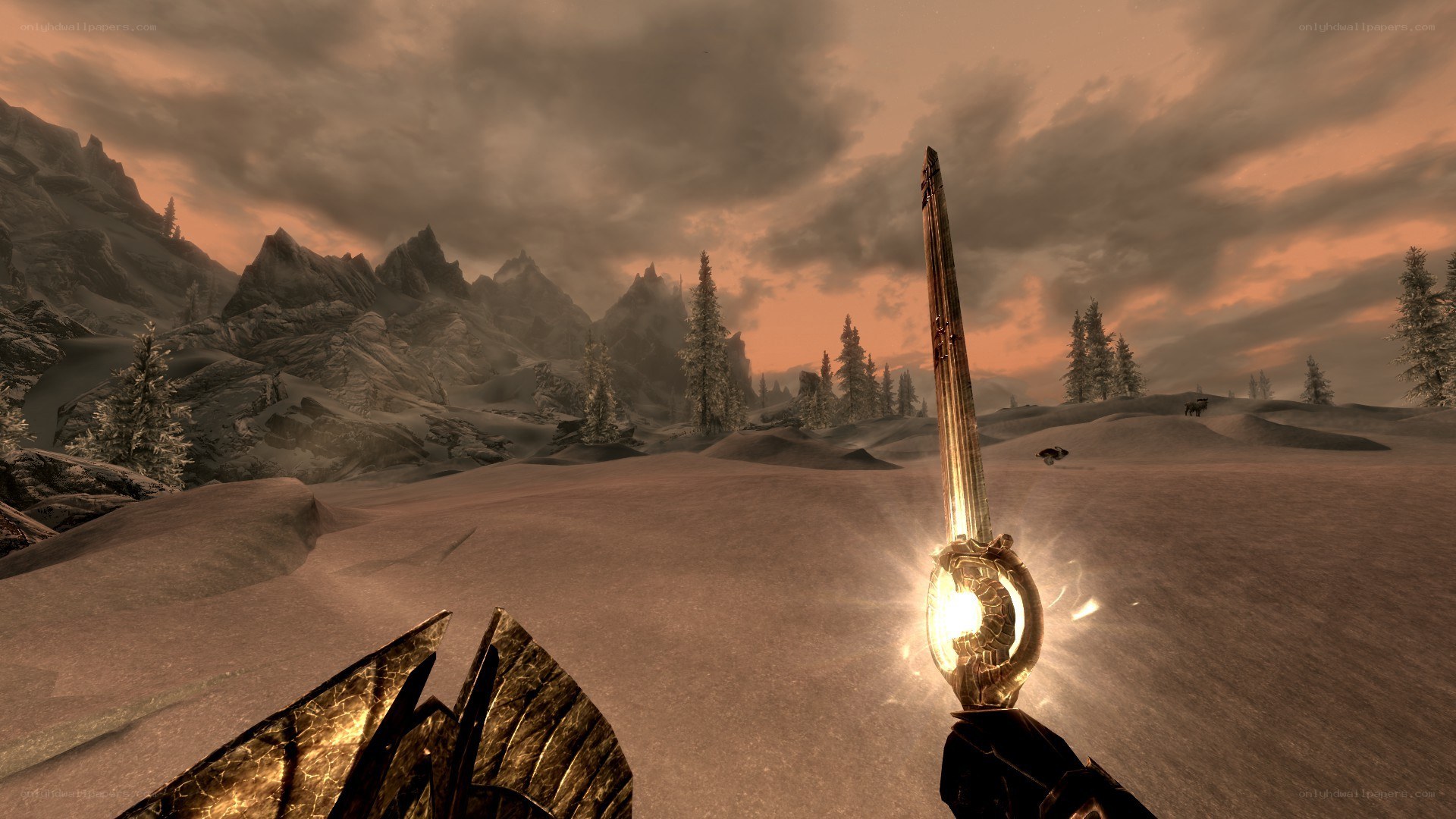sword in snowy landscape