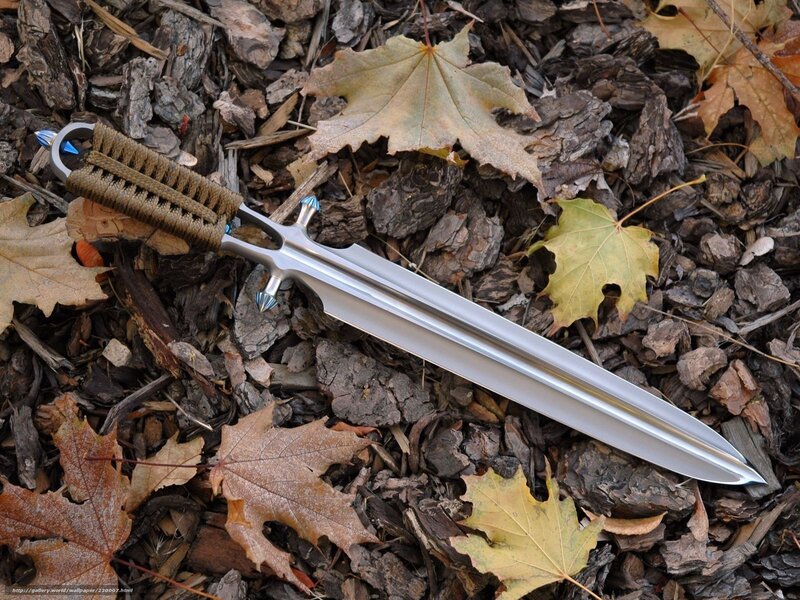 sword on autumn leaves