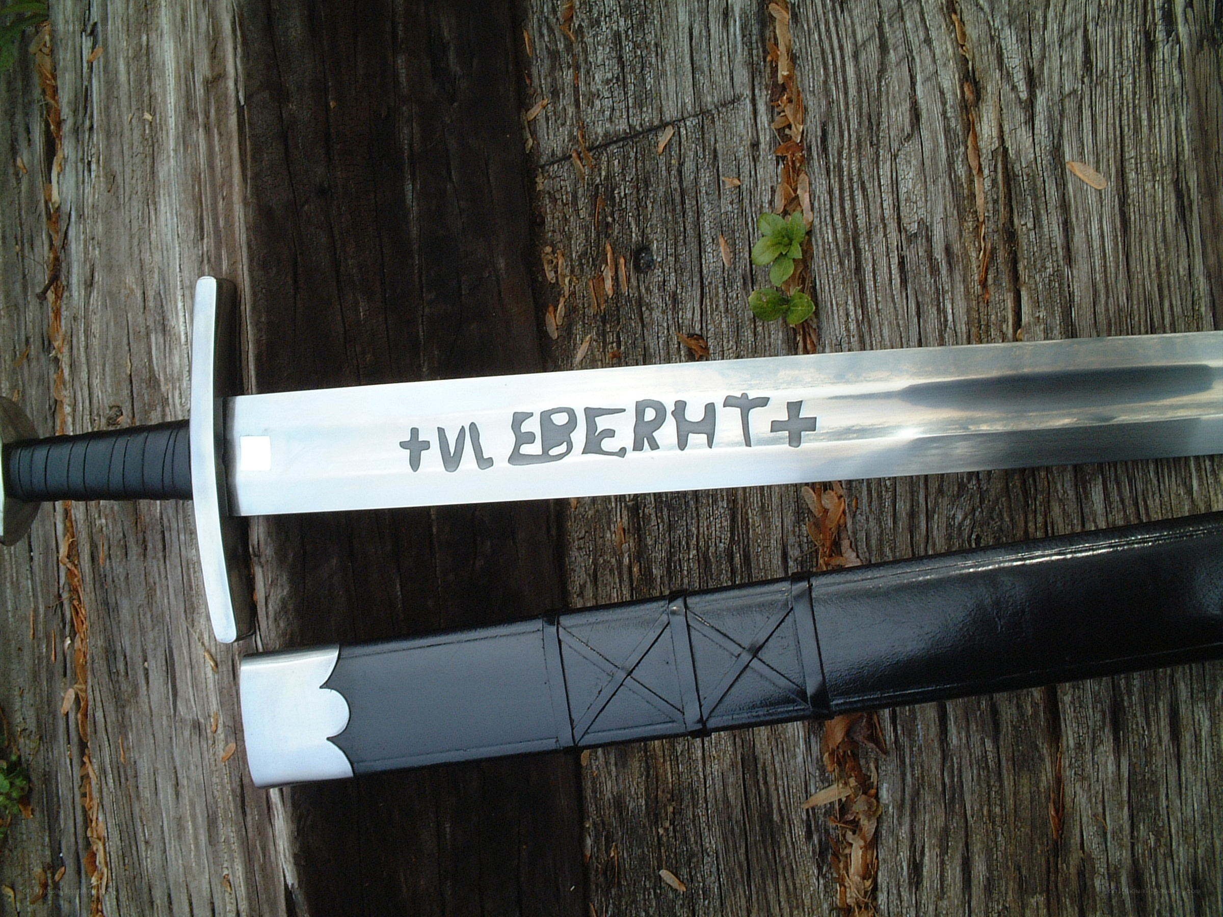 sword with inscription on blade