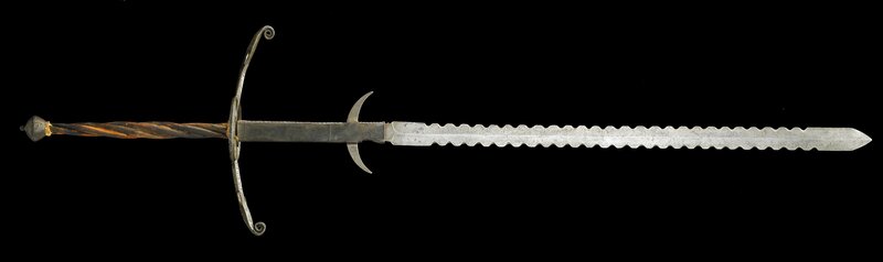 Sword with serrated blade
