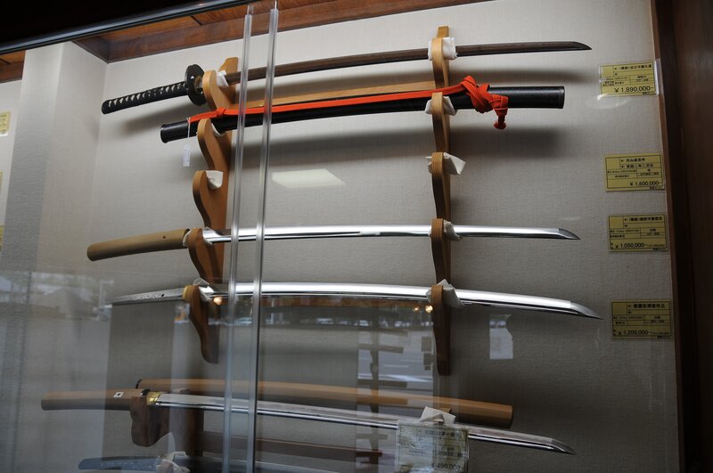 Swords in Display Case — Brown