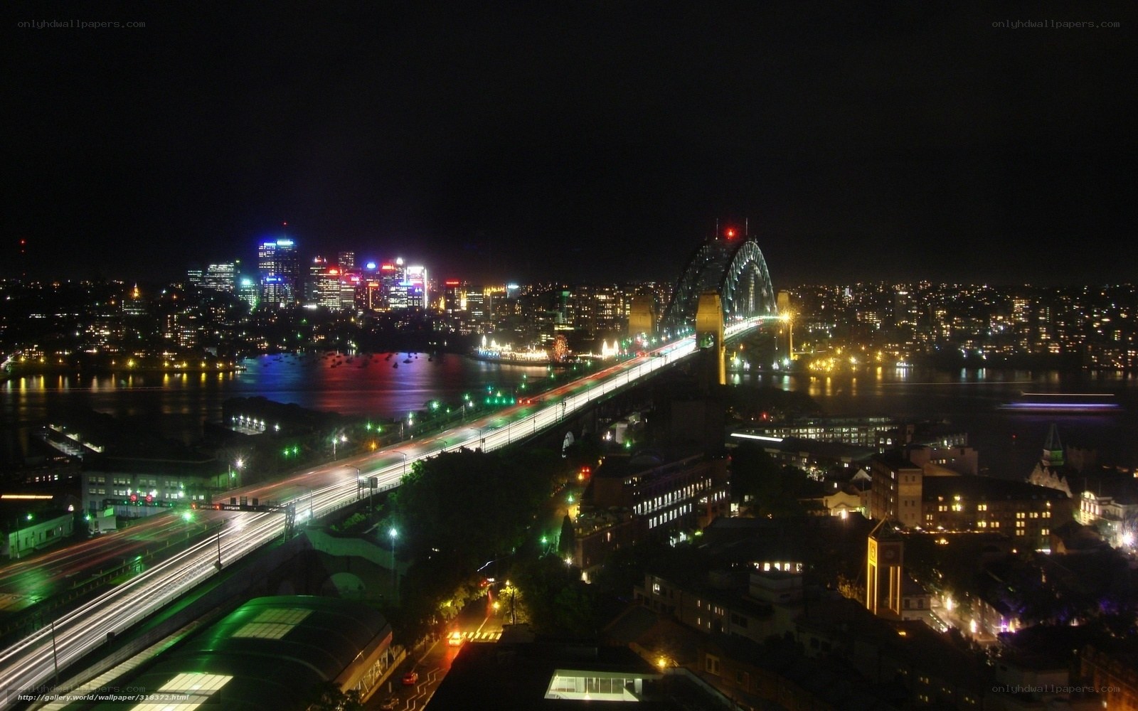 Sydney at night with bridge
