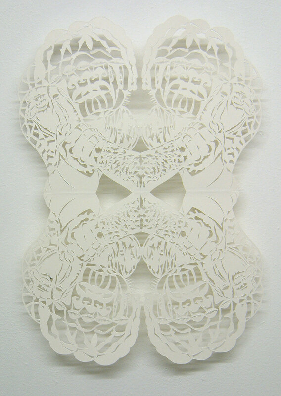 symmetrical paper cut artwork