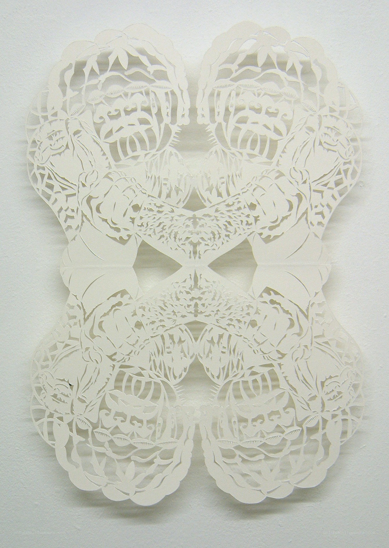 symmetrical paper cut artwork