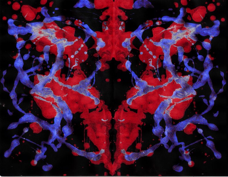 Symmetrical red and blue ink blot