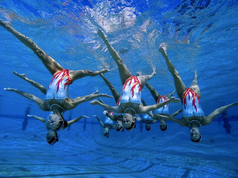 synchronized swimmers underwater