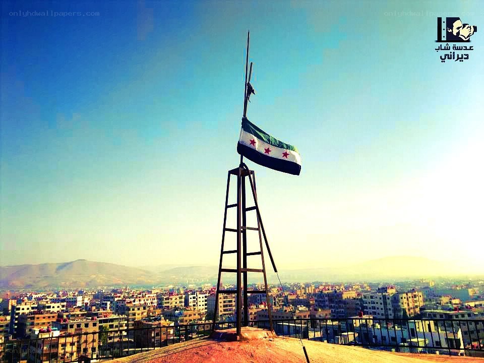 Syrian flag on a rooftop