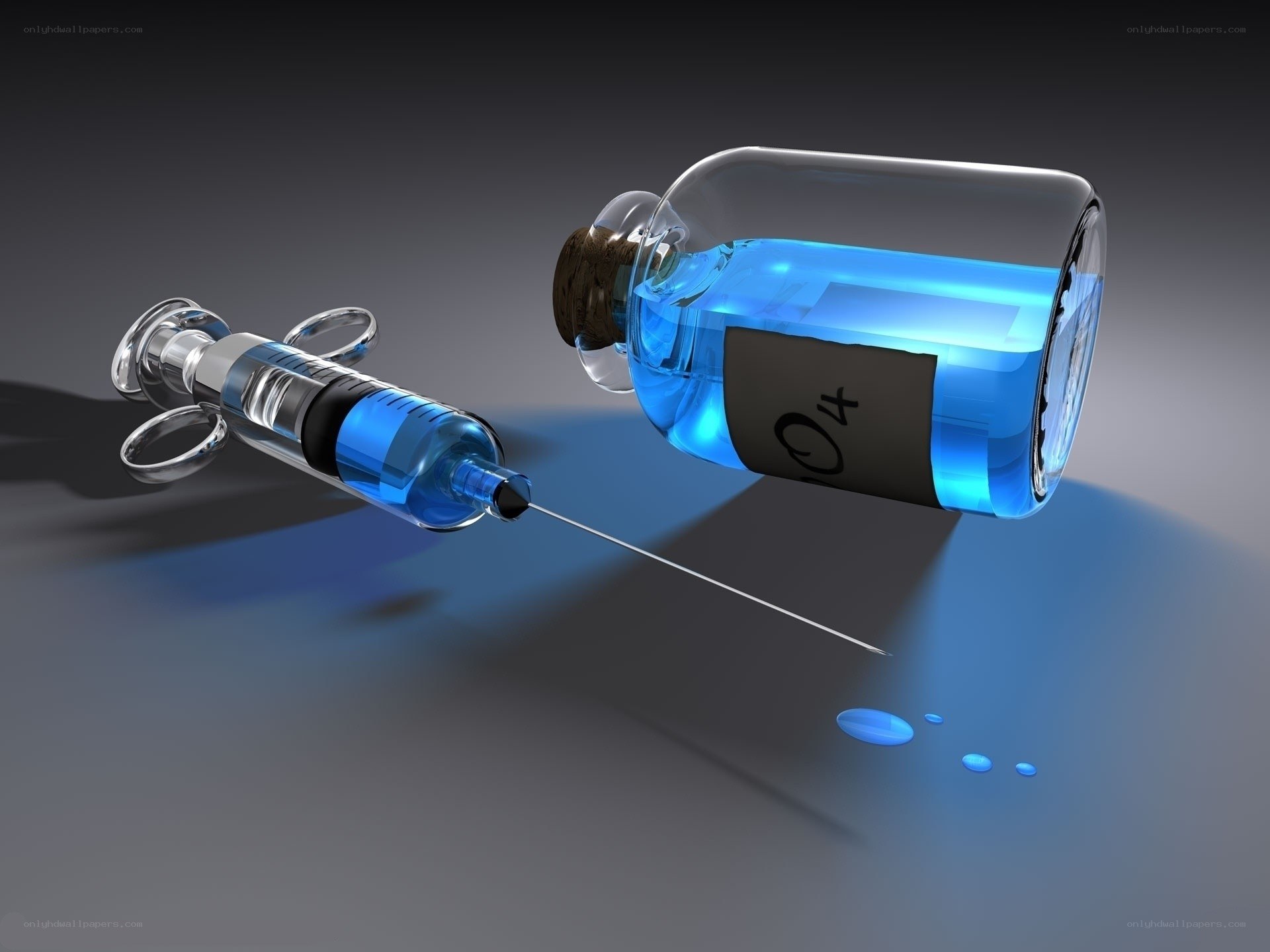 Syringe drawing blue liquid