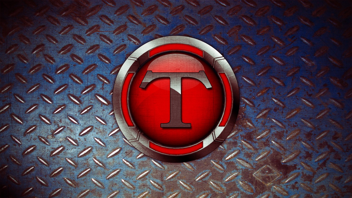 T logo on metal background