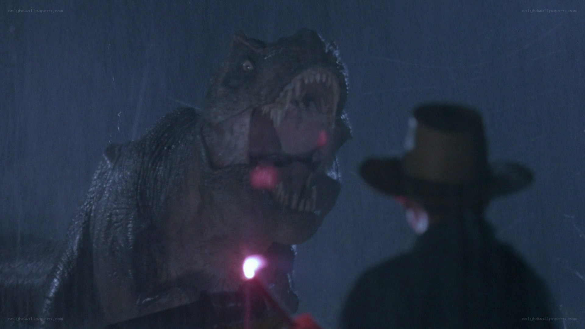 T-Rex confronts man in rain