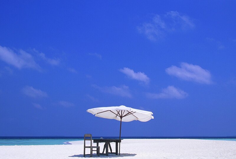 Table and Umbrella on Beach — Blue