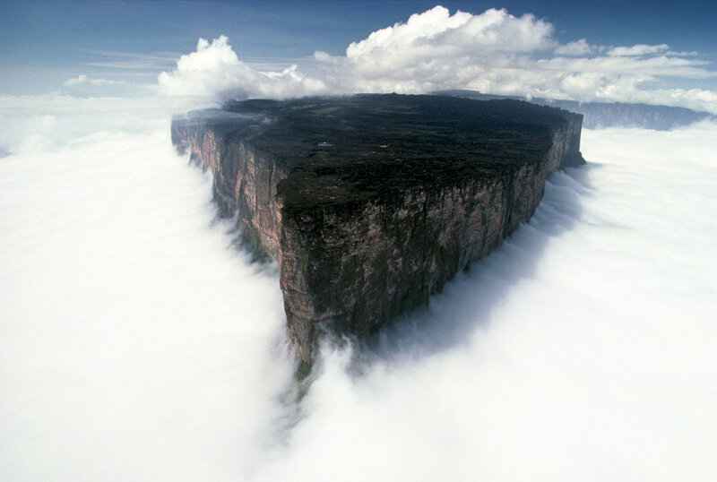 Table-top mountain above clouds