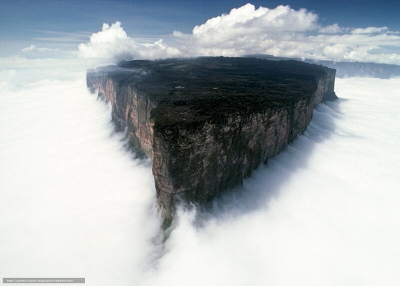 Table-top mountain above clouds