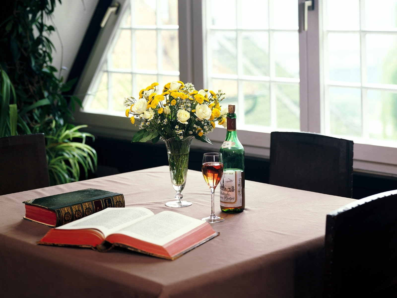 Table with books and wine