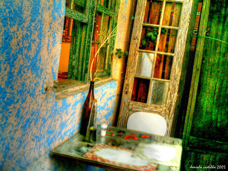 Table with Bottles and Chair