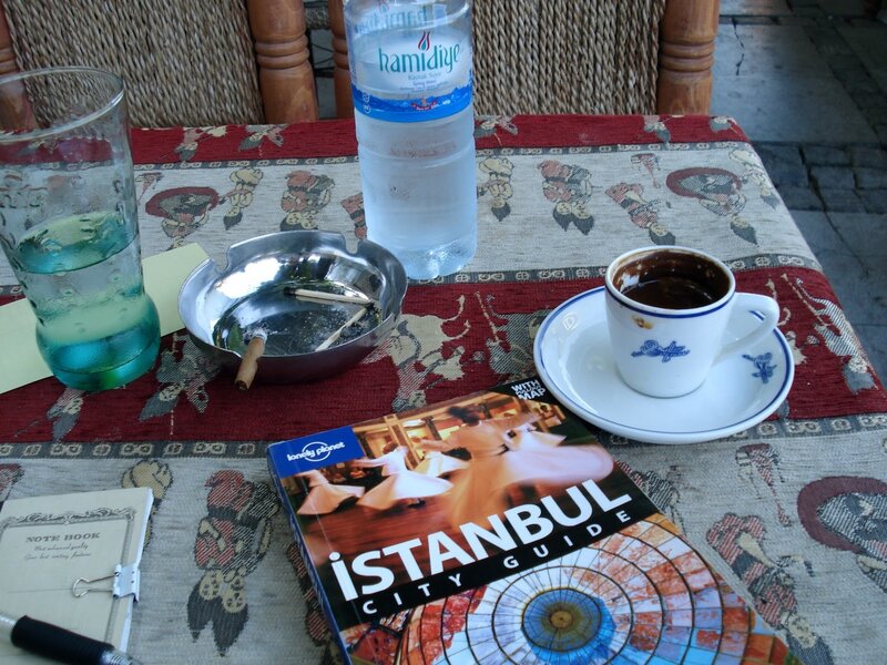 Table with Coffee and Guidebook
