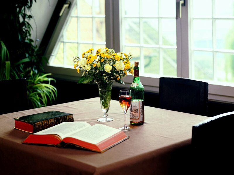 Table with Flowers and Books