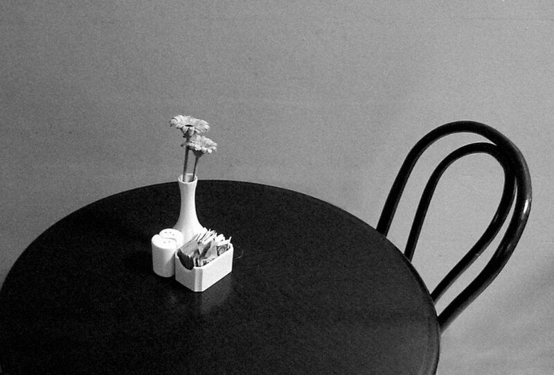 Table with Flowers and Condiments