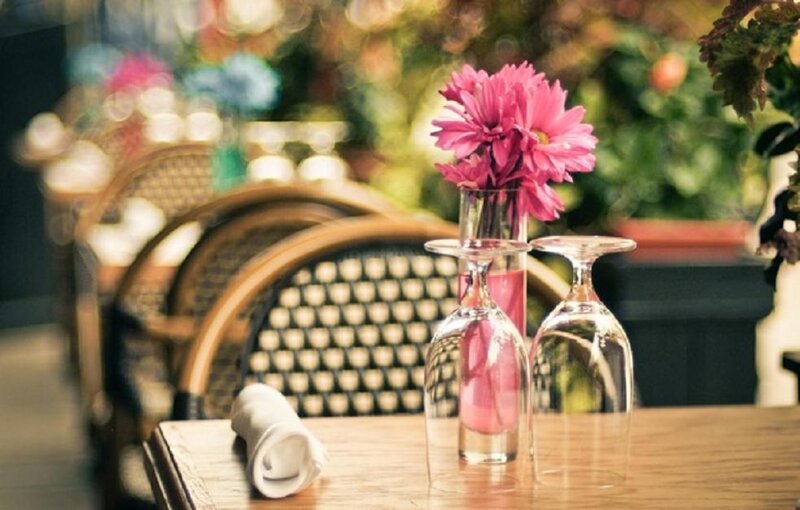 Table with Flowers and Glasses — Pink