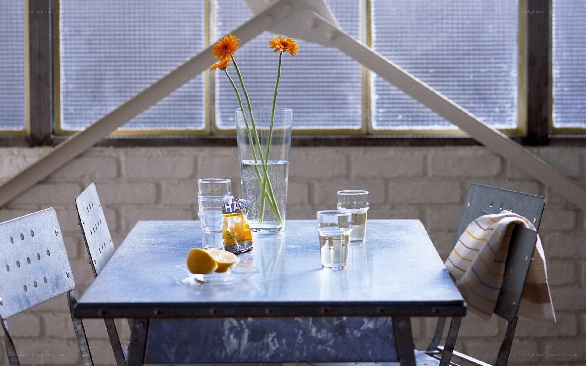 Table with flowers and lemon