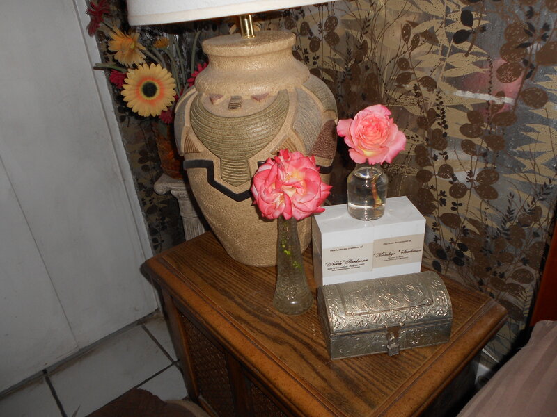 Table with Flowers and Urn