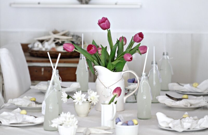 Table with Tulips and Bottles