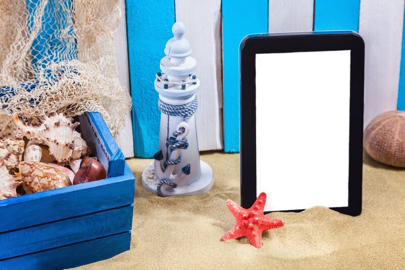 Tablet on Sandy Beach
