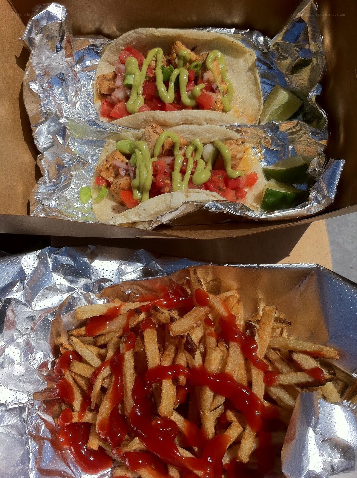 tacos and fries in a box