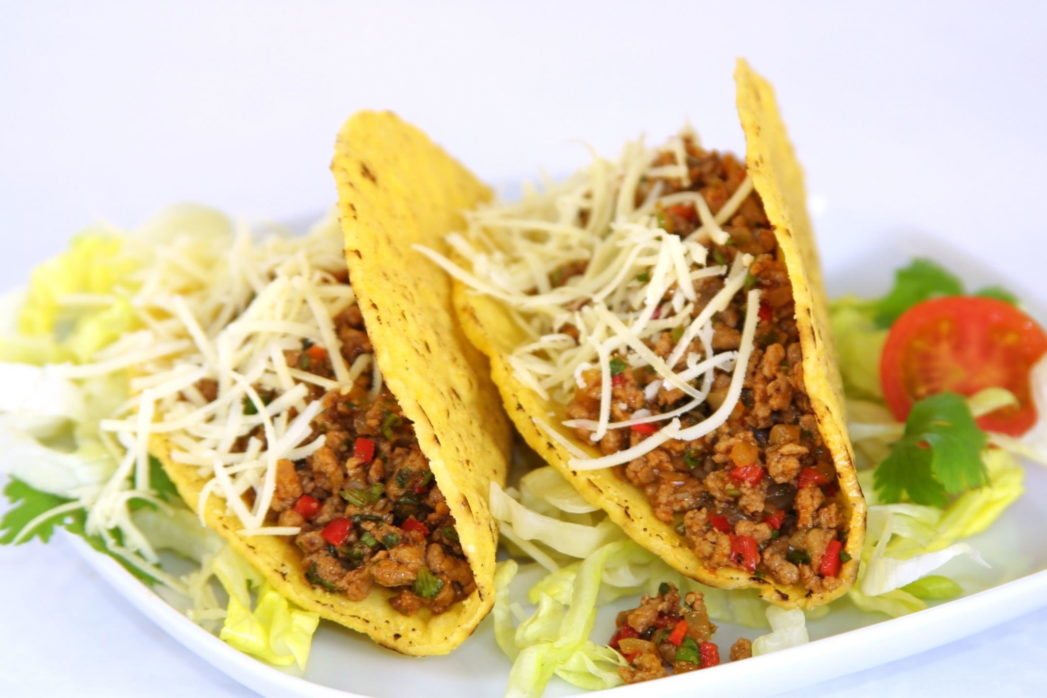 Tacos with ground meat and cheese