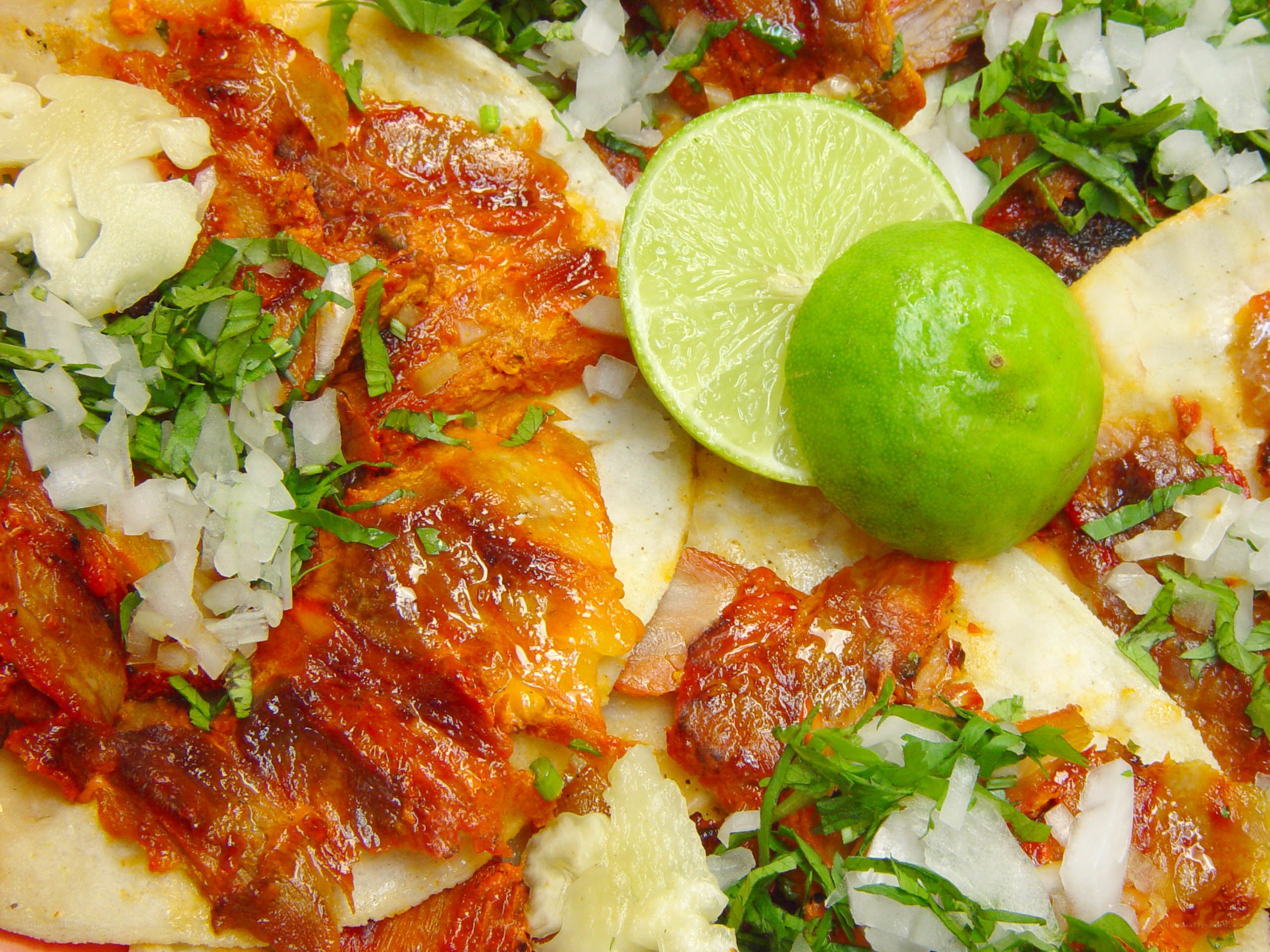 Tacos with lime and garnishes
