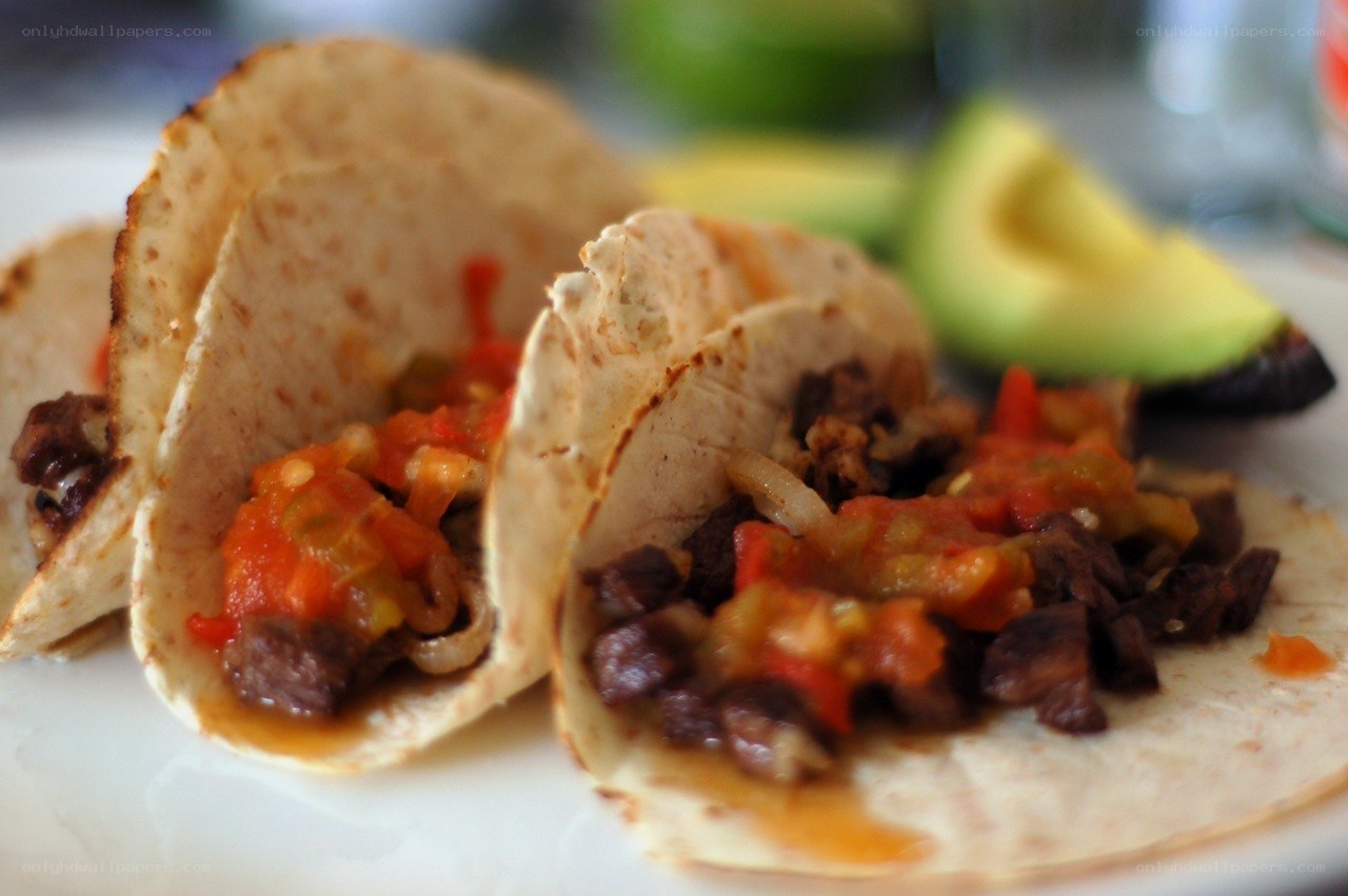 tacos with meat and salsa