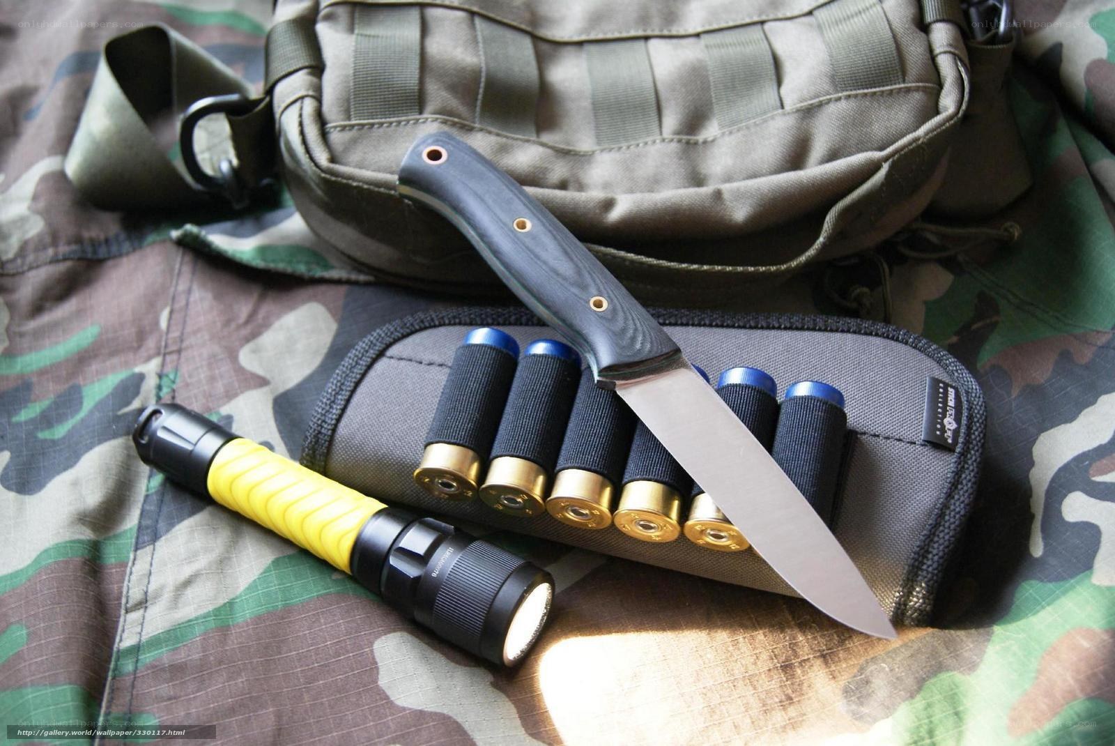 tactical gear with knife and flashlight