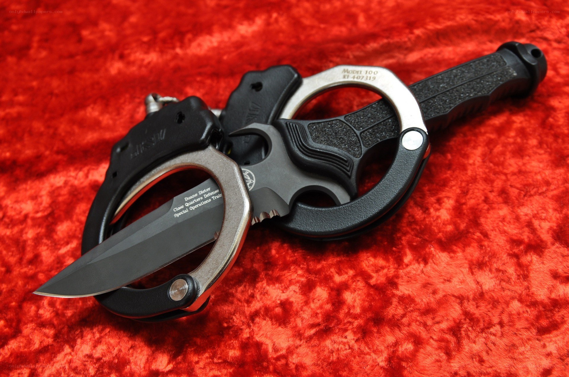 tactical knife and handcuffs