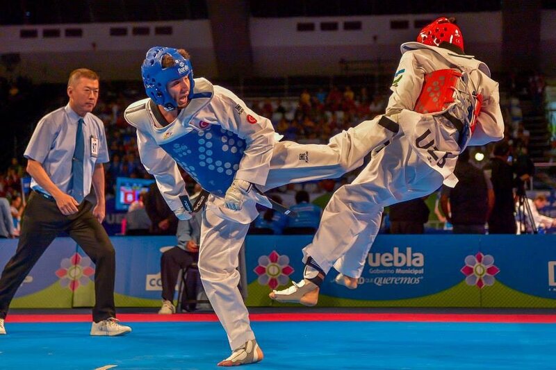 Taekwondo Athletes in Action — Blue, Intense, Night
