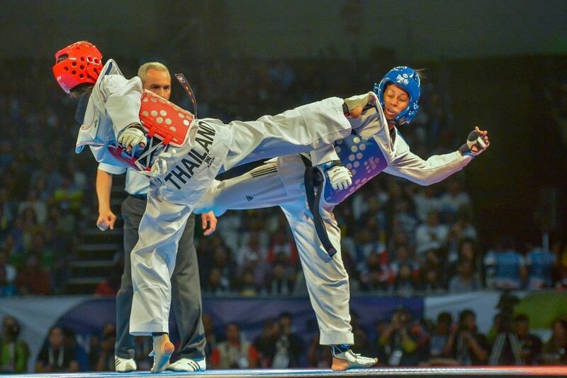 Taekwondo Athletes in Action — White, Intense, Night