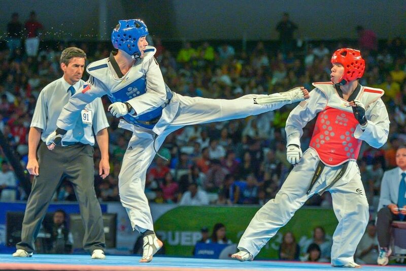 Taekwondo Athletes in Action — White, Intense, Photograph, Referee, Audience