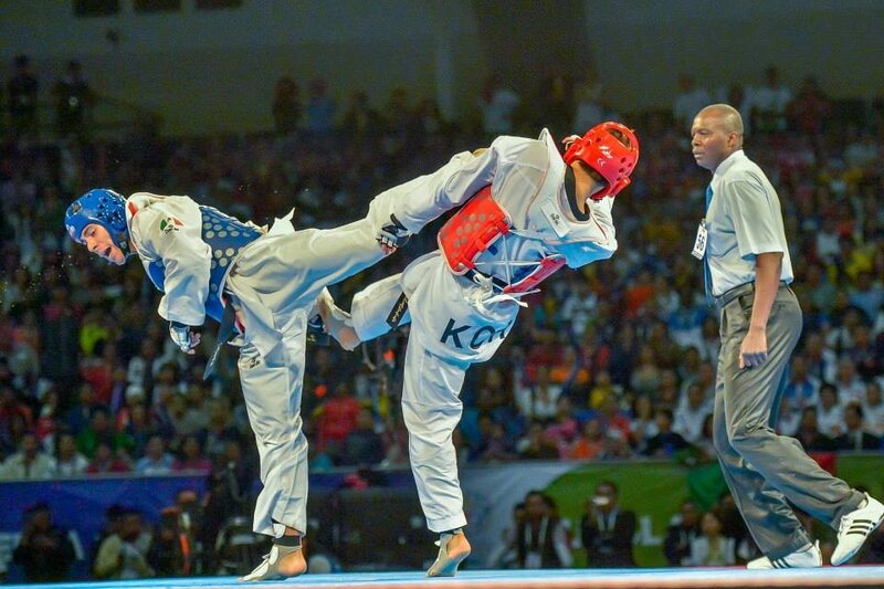 Taekwondo Athletes in Action — White, Intense