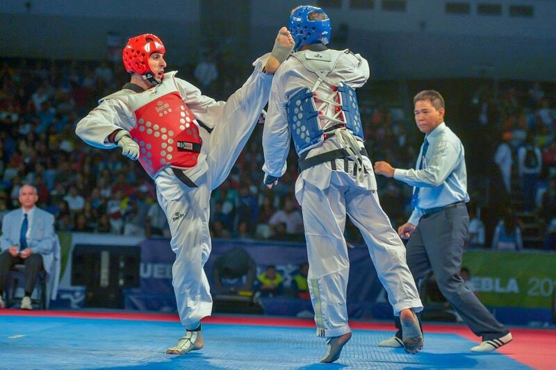 Taekwondo Athletes in Match — Blue, Intense