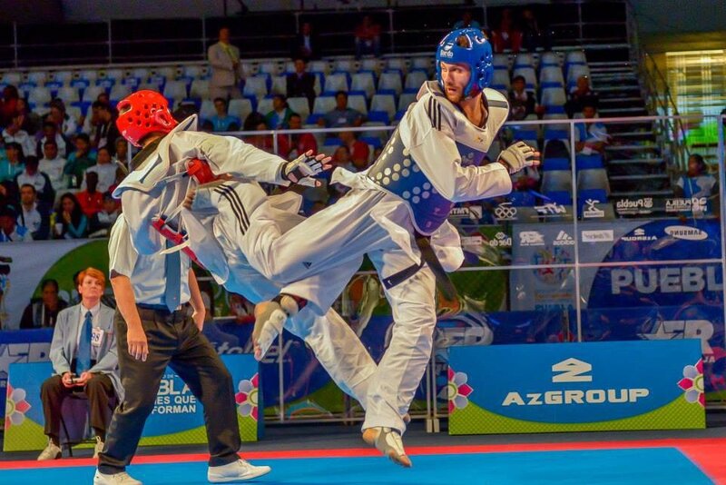 Taekwondo Fighters in Action — Blue