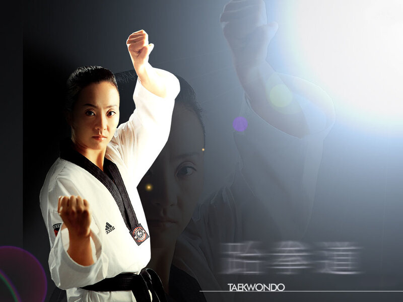 Taekwondo martial artist in action